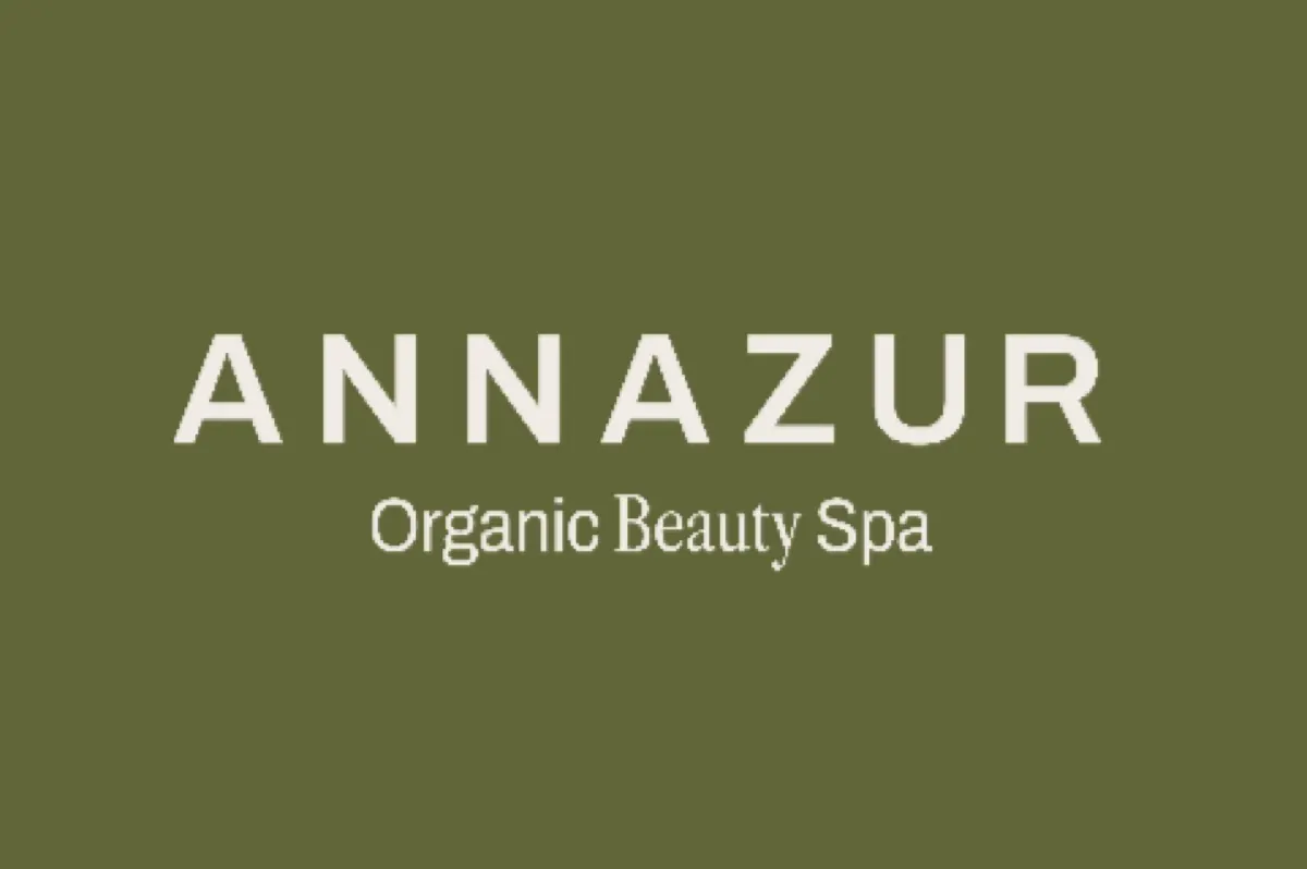 ANNAZUR Organic Beauty Spa logo on an olive green background
