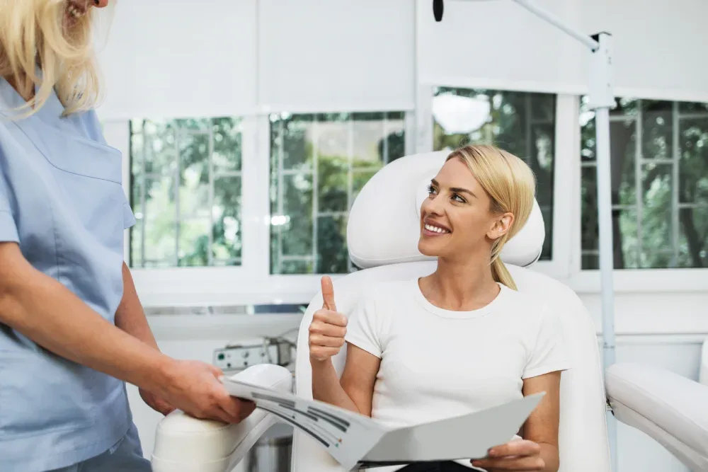 A satisfied client gives a thumbs-up, representing the final personal decision to proceed with a lip blushing treatment after weighing the pros and cons.