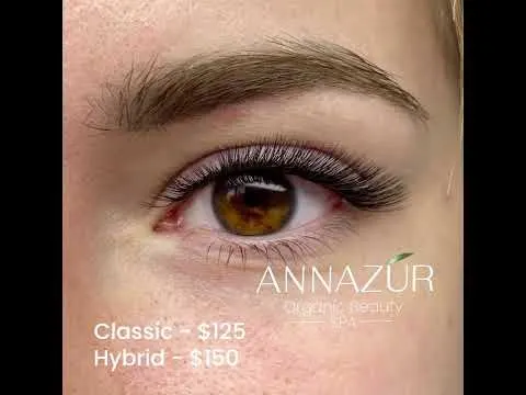 Woman models a full set of eyelash extensions at ANNAZUR